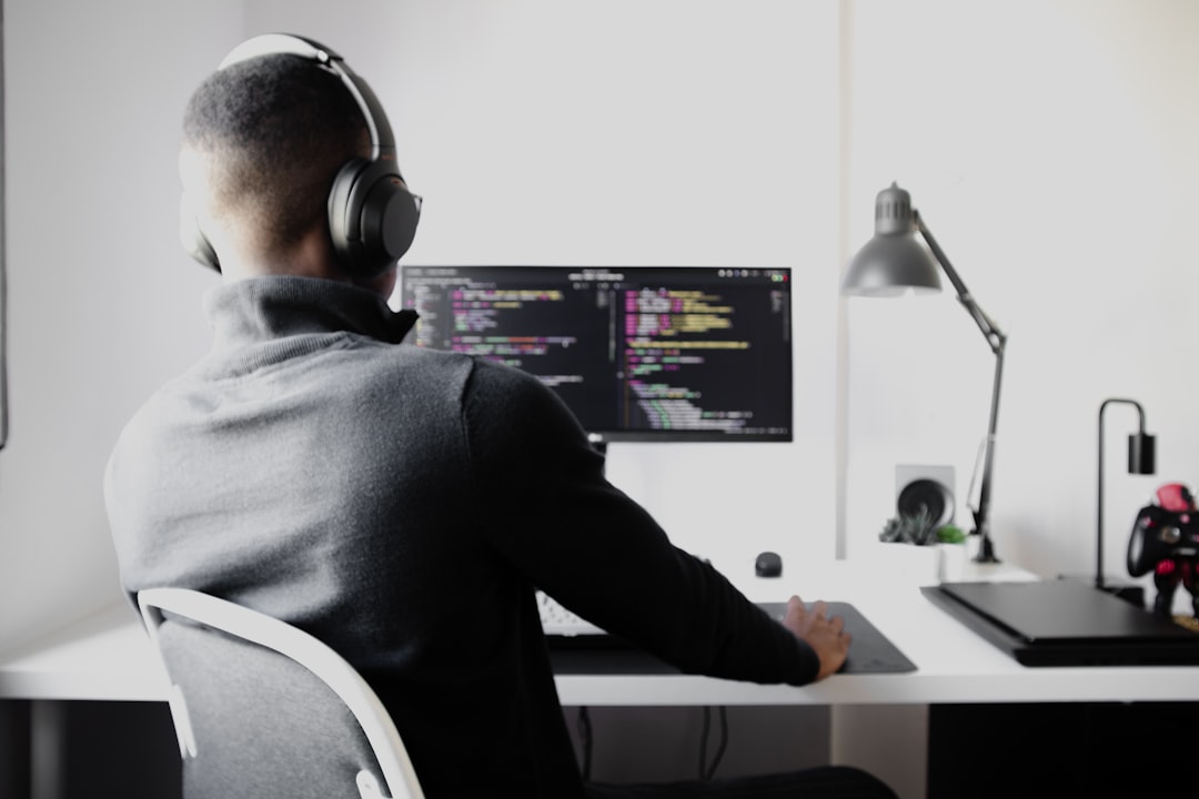 Developer comparing open weight model output on a laptop
